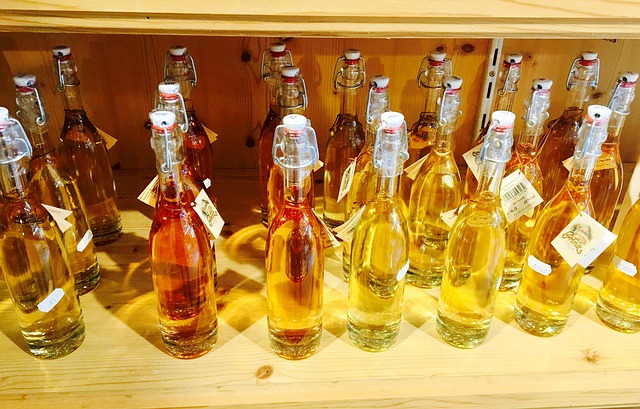 21 bottles of vinegar in clear glass bottles
